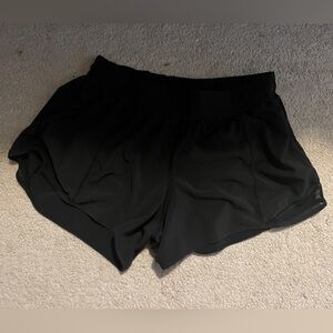 Size 10 Lululemon Low rise hottie hot shorts 4 inch